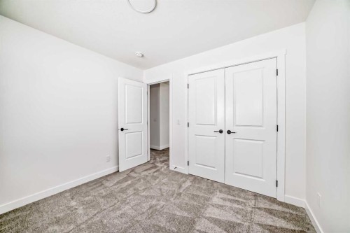 2 Appaloosa Way, Cochrane, AB - Indoor Photo Showing Other Room