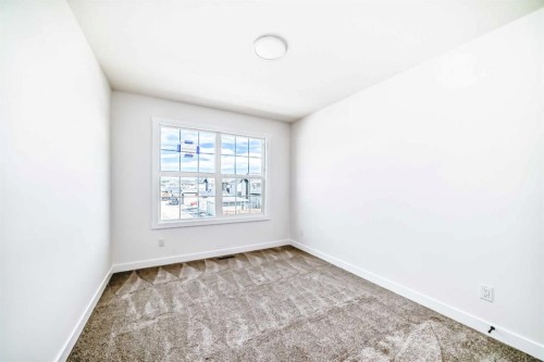 2 Appaloosa Way, Cochrane, AB - Indoor Photo Showing Other Room