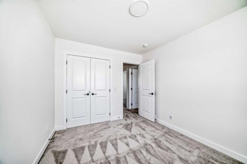 2 Appaloosa Way, Cochrane, AB - Indoor Photo Showing Other Room