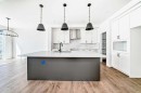2 Appaloosa Way, Cochrane, AB  - Indoor Photo Showing Kitchen With Upgraded Kitchen 