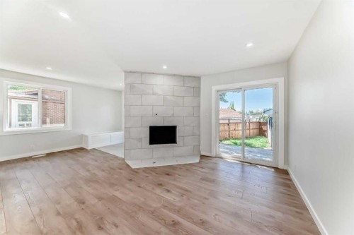5173 Whitestone Road Ne, Calgary, AB - Indoor With Fireplace