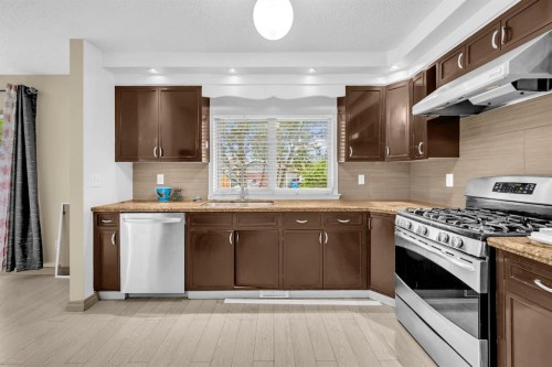79 Abalone Way Ne, Calgary, AB - Indoor Photo Showing Kitchen