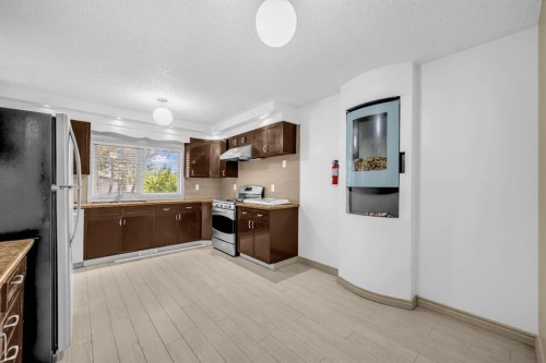 79 Abalone Way Ne, Calgary, AB - Indoor Photo Showing Kitchen
