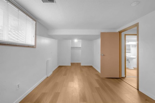 79 Abalone Way Ne, Calgary, AB - Indoor Photo Showing Other Room