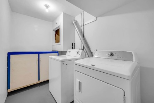 79 Abalone Way Ne, Calgary, AB - Indoor Photo Showing Laundry Room