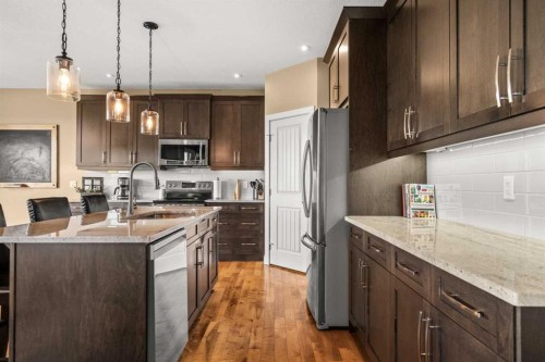 653 West Highland Crescent, Carstairs, AB - Indoor Photo Showing Kitchen