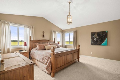 653 West Highland Crescent, Carstairs, AB - Indoor Photo Showing Bedroom