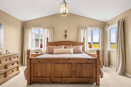 653 West Highland Crescent, Carstairs, AB - Indoor Photo Showing Bedroom