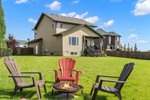 653 West Highland Crescent, Carstairs, AB - Outdoor With Deck Patio Veranda