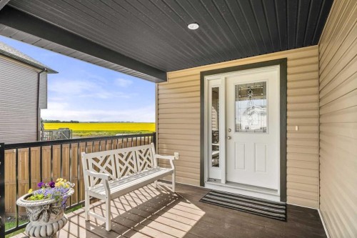 653 West Highland Crescent, Carstairs, AB - Outdoor With Deck Patio Veranda With Exterior