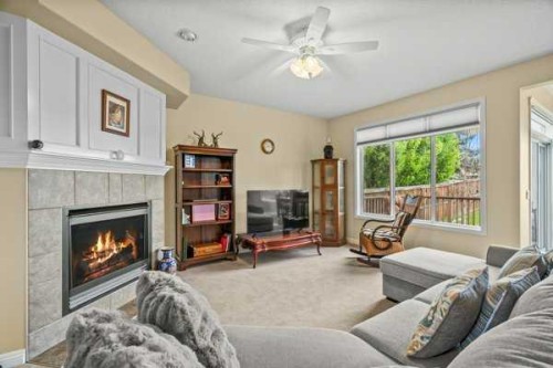 160 Royal Oak Heights Nw, Calgary, AB - Indoor Photo Showing Living Room With Fireplace