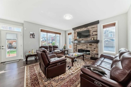 107 Nolancrest Rise Nw, Calgary, AB - Indoor Photo Showing Living Room With Fireplace