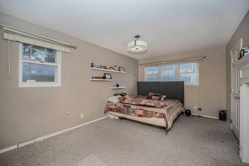 1306 1 Avenue, Canmore, AB - Indoor Photo Showing Bedroom