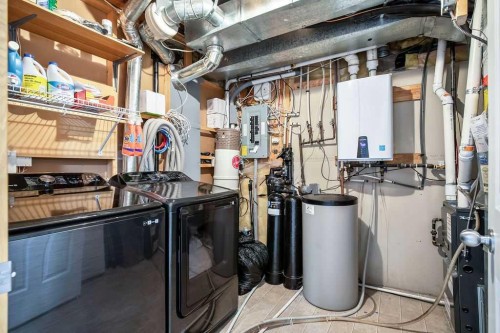 128 Cramond Crescent Se, Calgary, AB - Indoor Photo Showing Laundry Room
