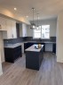 42 Setonvista Grove Se, Calgary, AB  - Indoor Photo Showing Kitchen 