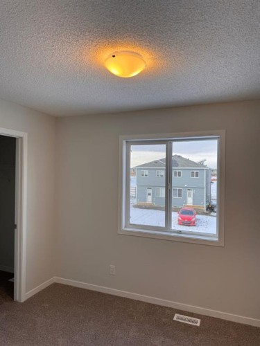 46 Setonvista Grove Se, Calgary, AB - Indoor Photo Showing Other Room