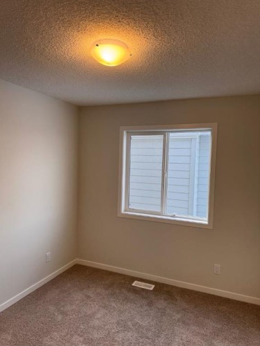 46 Setonvista Grove Se, Calgary, AB - Indoor Photo Showing Other Room