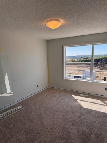 46 Setonvista Grove Se, Calgary, AB - Indoor Photo Showing Other Room