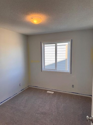 46 Setonvista Grove Se, Calgary, AB - Indoor Photo Showing Other Room