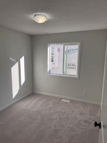 113 Setonvista Gate Se, Calgary, AB - Indoor Photo Showing Other Room