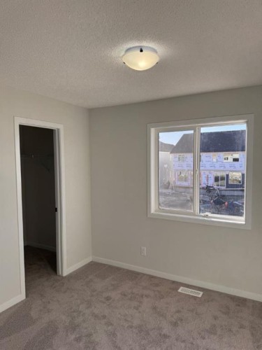 113 Setonvista Gate Se, Calgary, AB - Indoor Photo Showing Other Room