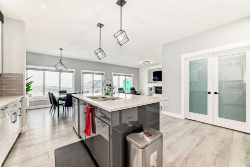 1120 Iron Landing Way, Crossfield, AB - Indoor Photo Showing Kitchen With Upgraded Kitchen