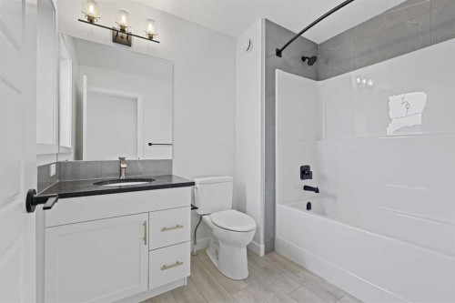 33 Magnolia Path Se, Calgary, AB - Indoor Photo Showing Bathroom