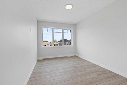 33 Magnolia Path Se, Calgary, AB - Indoor Photo Showing Other Room