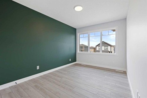 33 Magnolia Path Se, Calgary, AB - Indoor Photo Showing Other Room
