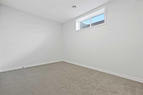 33 Magnolia Path Se, Calgary, AB - Indoor Photo Showing Other Room