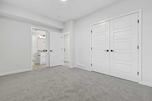 33 Magnolia Path Se, Calgary, AB - Indoor Photo Showing Other Room