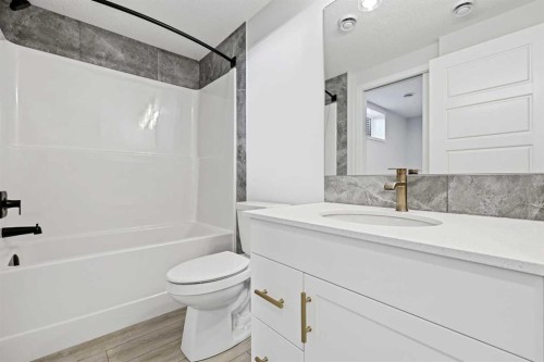 33 Magnolia Path Se, Calgary, AB - Indoor Photo Showing Bathroom