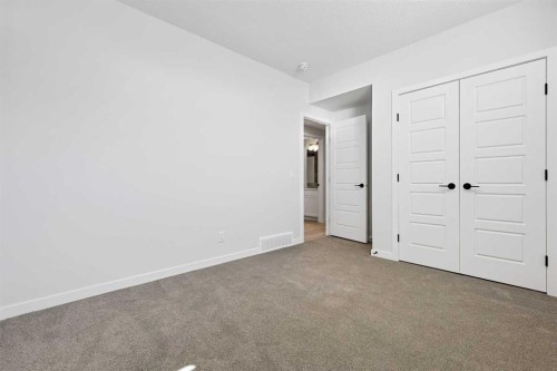 33 Magnolia Path Se, Calgary, AB - Indoor Photo Showing Other Room
