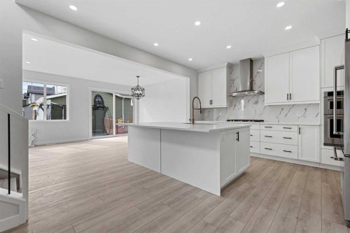 33 Magnolia Path Se, Calgary, AB - Indoor Photo Showing Kitchen With Upgraded Kitchen