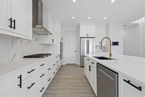 33 Magnolia Path Se, Calgary, AB - Indoor Photo Showing Kitchen With Upgraded Kitchen