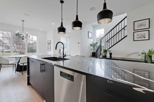 1440 26A Street Sw, Calgary, AB - Indoor Photo Showing Kitchen With Upgraded Kitchen