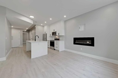 1440 26A Street Sw, Calgary, AB - Indoor With Fireplace