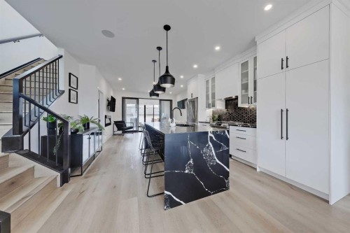 1440 26A Street Sw, Calgary, AB - Indoor Photo Showing Kitchen With Upgraded Kitchen
