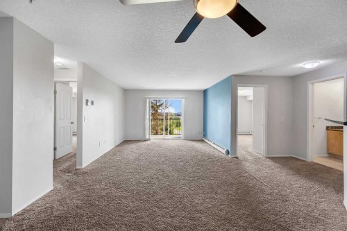 6307-304 Mackenzie Way Sw, Airdrie, AB - Indoor Photo Showing Other Room
