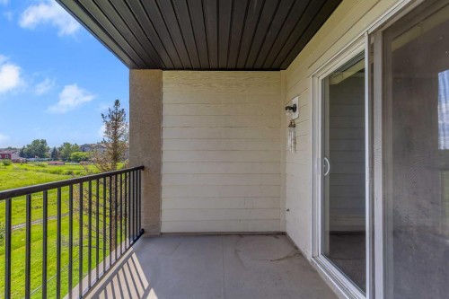 6307-304 Mackenzie Way Sw, Airdrie, AB - Outdoor With Exterior