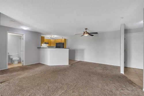 6307-304 Mackenzie Way Sw, Airdrie, AB - Indoor