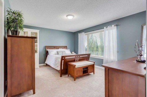 249 West Lakeview Place, Chestermere, AB - Indoor Photo Showing Bedroom