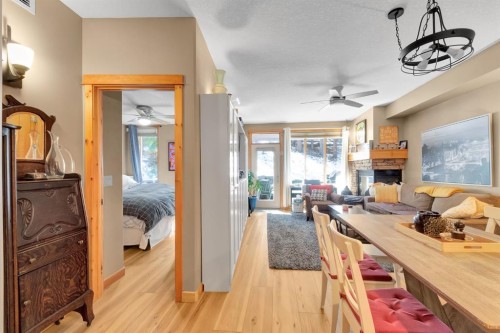 612-107 Armstrong Place, Canmore, AB - Indoor With Fireplace