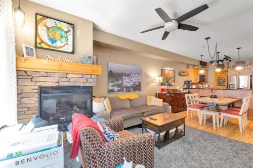 612-107 Armstrong Place, Canmore, AB - Indoor Photo Showing Living Room With Fireplace