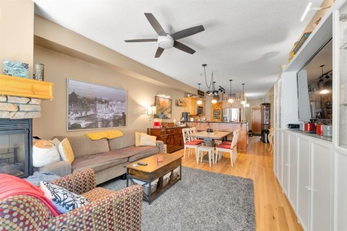 612-107 Armstrong Place, Canmore, AB - Indoor Photo Showing Living Room With Fireplace