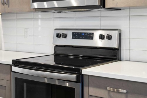12-30 Shawnee Common Sw, Calgary, AB - Indoor Photo Showing Kitchen