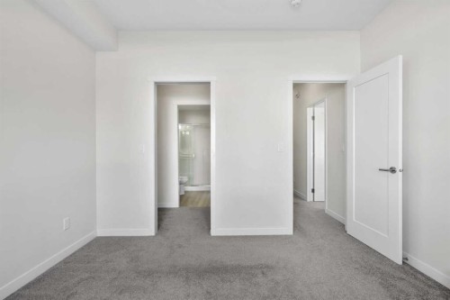 12-30 Shawnee Common Sw, Calgary, AB - Indoor Photo Showing Other Room