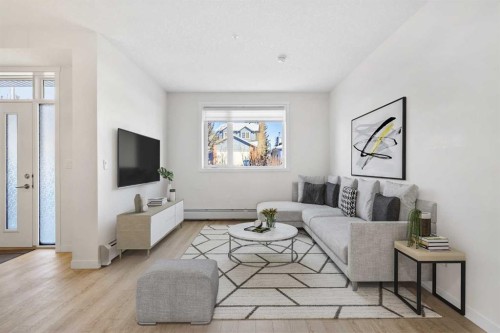 12-30 Shawnee Common Sw, Calgary, AB - Indoor Photo Showing Living Room