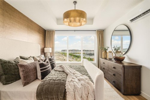 205-10 Cascade Ridge, Canmore, AB - Indoor Photo Showing Bedroom