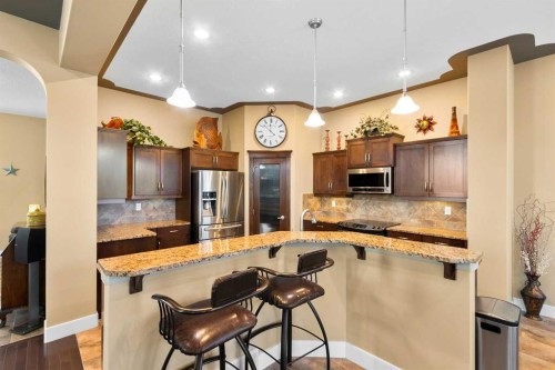 117 Kingsland Court Se, Airdrie, AB - Indoor Photo Showing Kitchen With Upgraded Kitchen